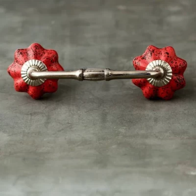 REDISH-BROWN FLOWER CABINET OR DRAWER PULL